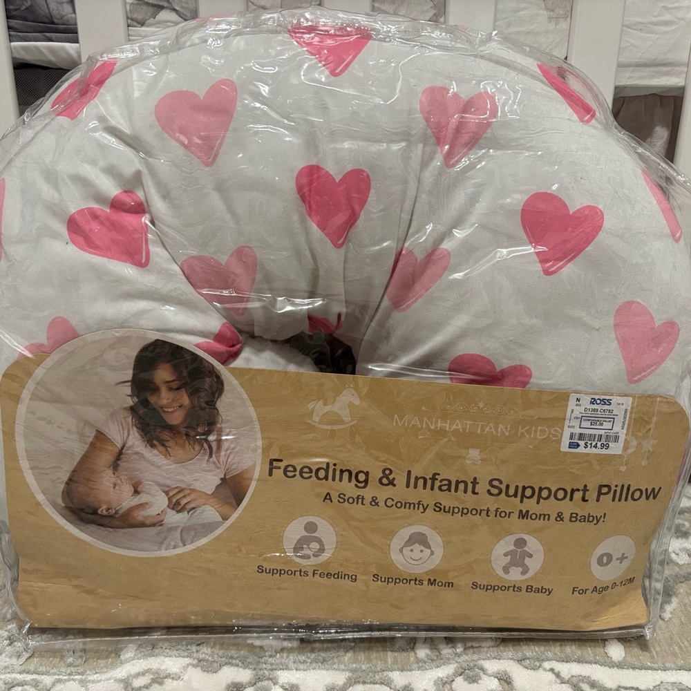 Gently used Pink and White Heart Nursing Pillow